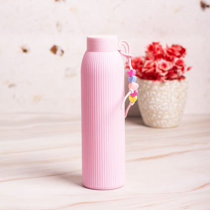 pastel glass water bottle with plastic outer