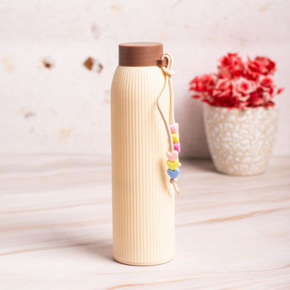 pastel glass water bottle with plastic outer